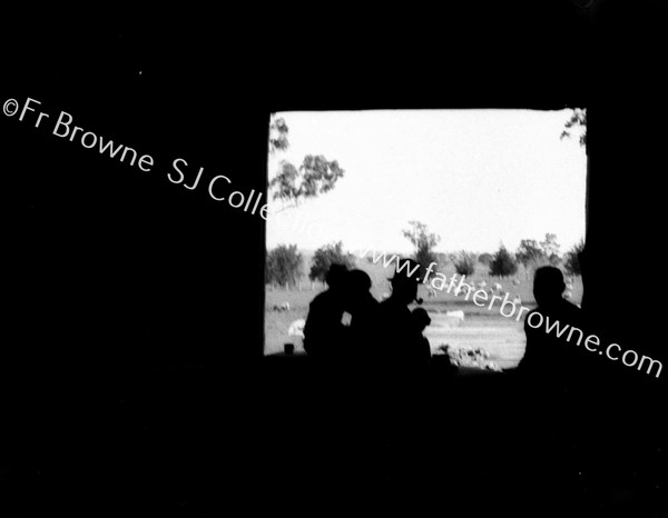 SHEARERS ON THE BENCH & SILLOUETTE THROUGH WINDOW